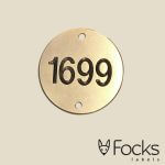 Number label brass, engraved and lacquered, with holes.